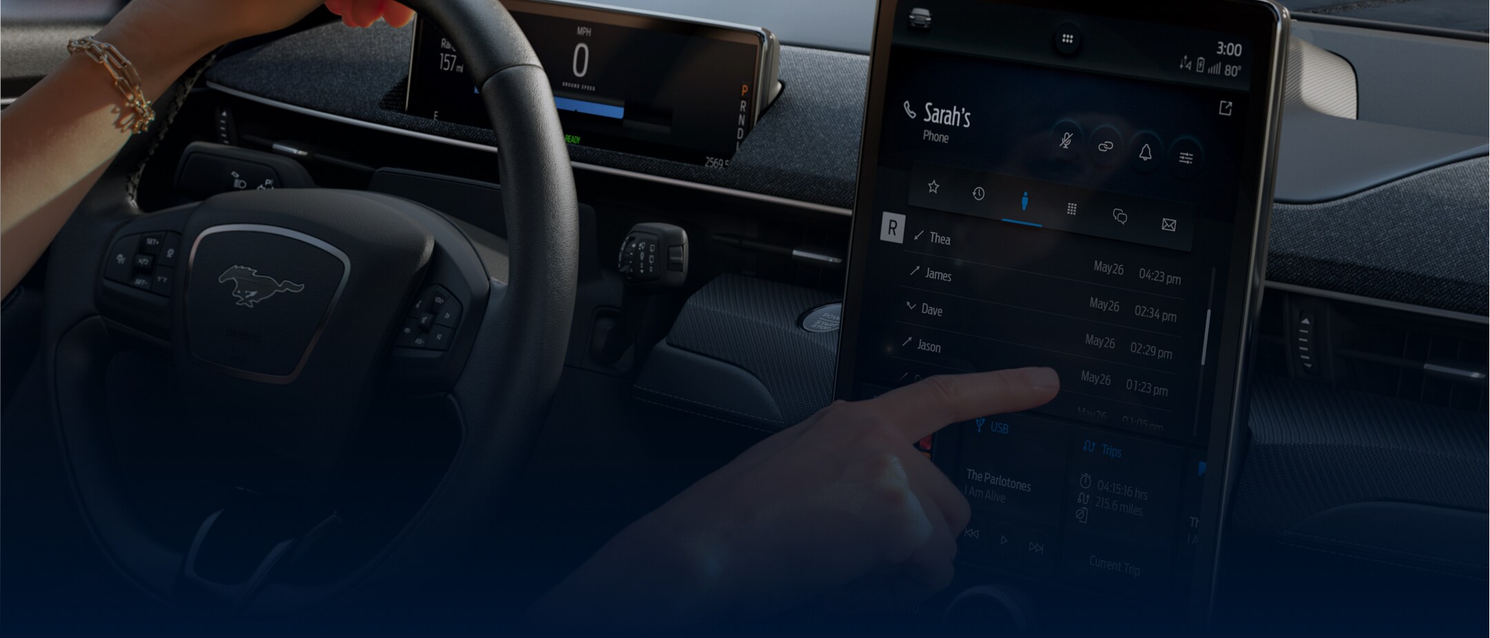 Close up of steering wheel, centre console and SYNC 4 touchscreen