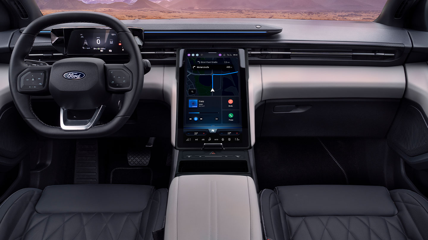 Vista ravvicinata del cruscotto del Ford Explorer, con il volante e l’ampio touchscreen SYNC Move da 14.6".