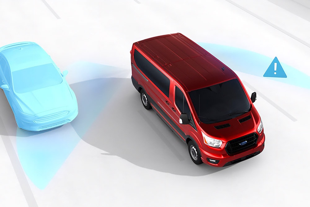 Vista grafica dall'alto di un furgone Ford Transit rosso con icone di avviso di sicurezza.